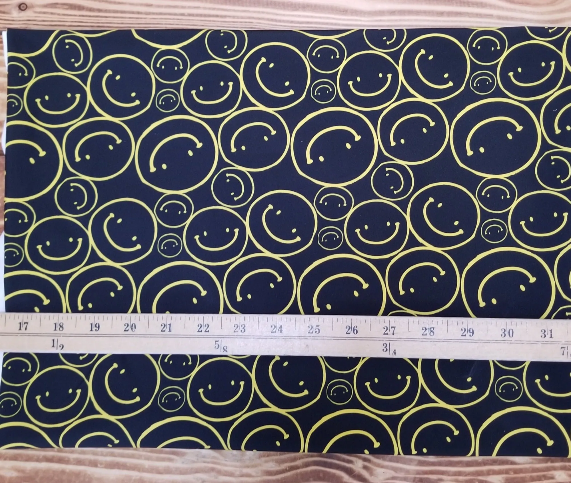 End of Bolt: 1.5 yards of Designer Deadstock Nylon Spandex Swim Performance Wear All Smiles Black and Yellow Conversational Knit- remnant