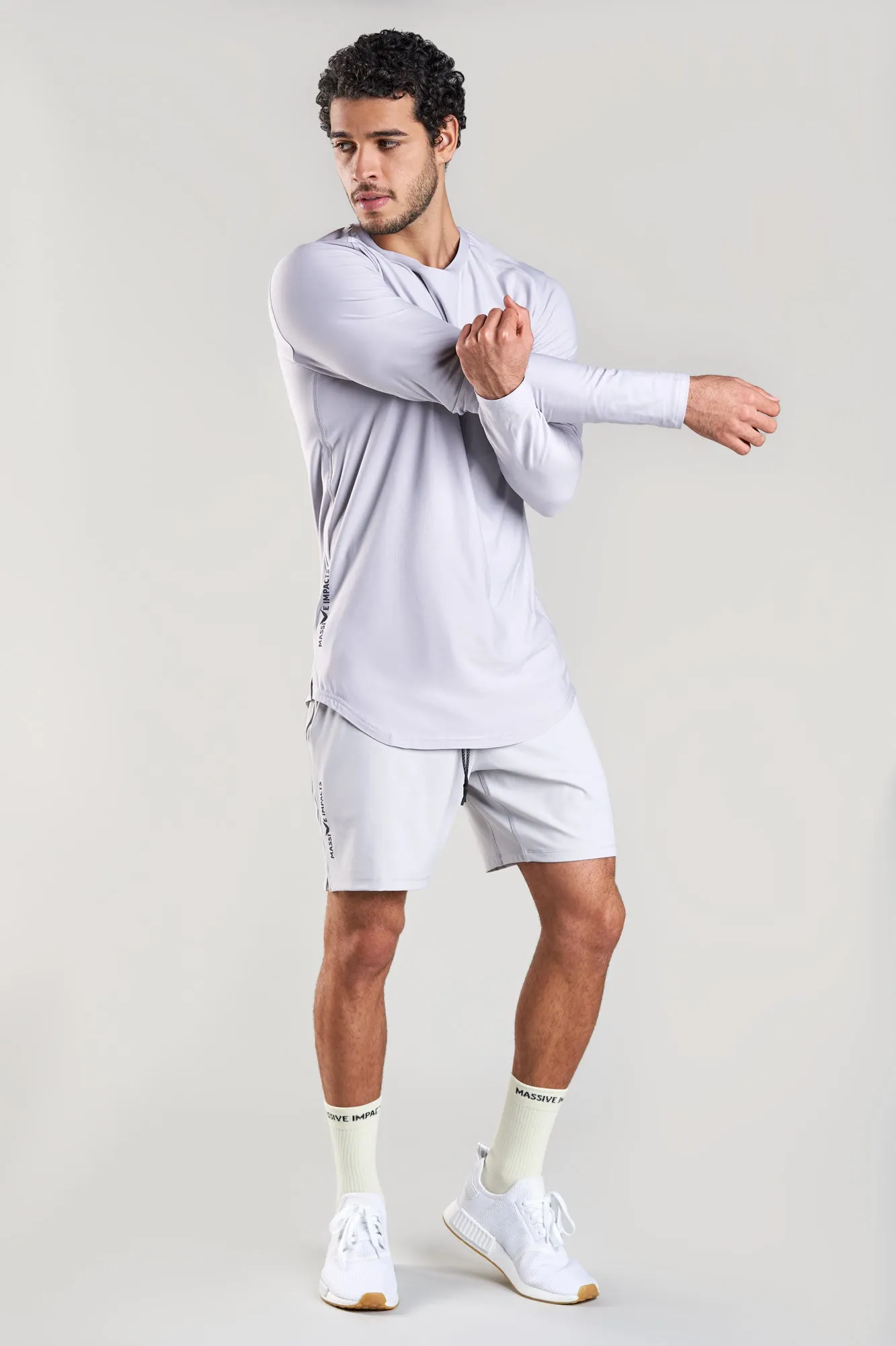 J002MI Recycled Polyester Stretch Long-Fit Sleeve Top